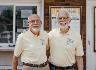 A picture of the 2 current owners of the store